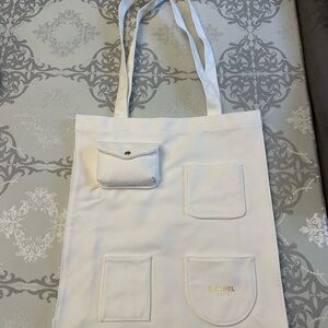 CHANEL White and Gold Canvas Pocket Detail